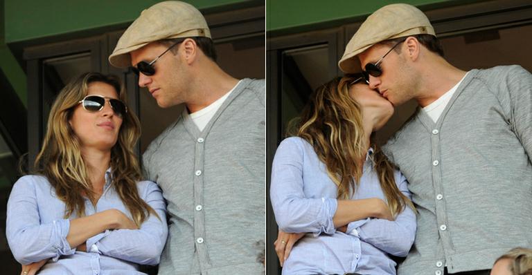 Gisele Bündchen e Tom Brady trocam carinho em jogo de beisebol