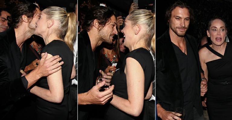 Sharon Stone conversa ao pé do ouvido com modelo argentino em festa