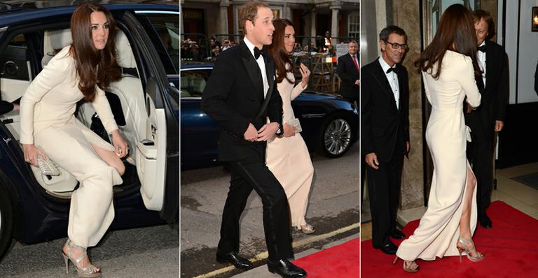 Kate Middleton deixa perna à mostra em jantar black tie