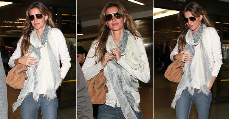 Gisele Bündchen chega ao Brasil para desfile de lingerie