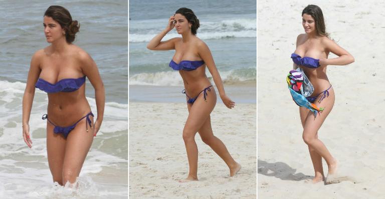 Ex-BBB Laisa exibe boa forma na praia