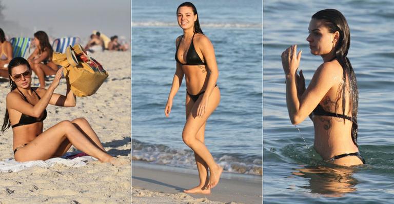 As curvas perfeitas de Ísis Valverde em tarde ensolarada em praia do Rio de Janeiro