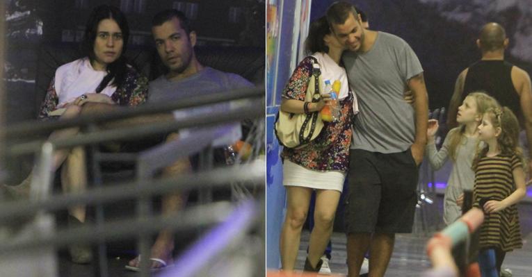 Alessandra Negrini passeia com o namorado e a filha