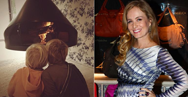 Angélica e Luciano Huck mostram fotos de Joaquim e Benício se aquecendo na lareira