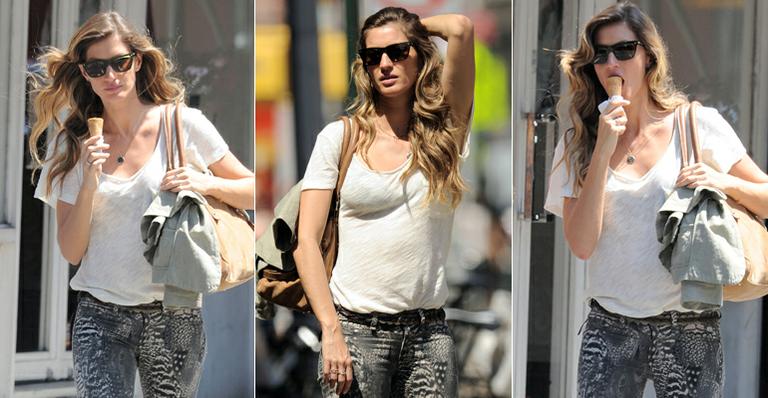 Gisele Bündchen disfarça barriguinha em passeio por Nova York