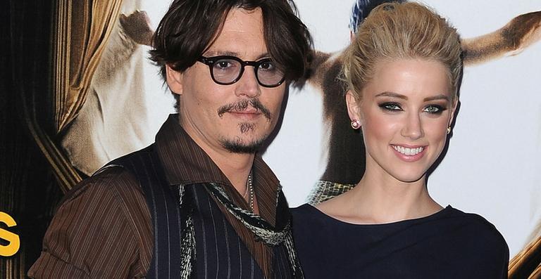 Amber Heard pede ordem de restrição contra Johnny Depp, diz revista