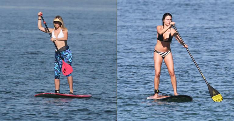 Susana Werner e Ísis Valverde praticam stand up paddle no Rio de Janeiro