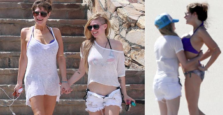 Avril Lavigne é fotografada trocando carinhos com morena no México