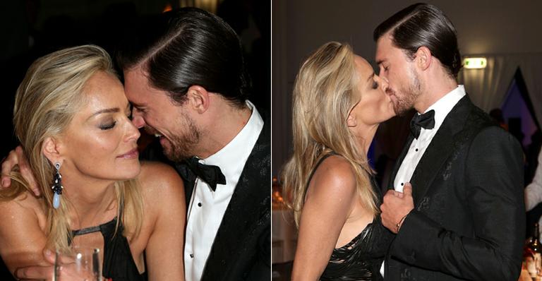 Sharon Stone troca beijos e carícias com Martin Mica durante jantar em Milão