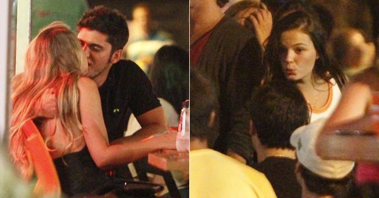Bruno Gissoni beija loira e Ísis Valverde se diverte entre amigos no Rio