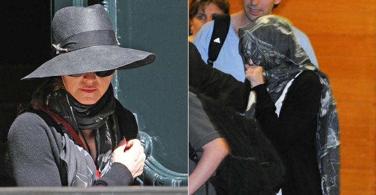 Madonna esconde o rosto na chegada à Argentina para shows da ‘MDNA Tour’