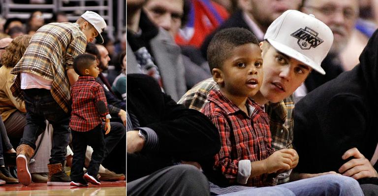 Justin Bieber cuida de filho de atleta em jogo de basquete nos Estados Unidos