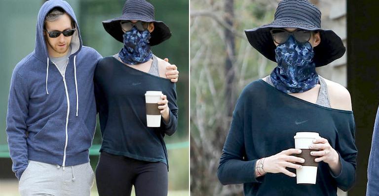 Anne Hathaway usa disfarce a la Michael Jackson em passeio com o marido