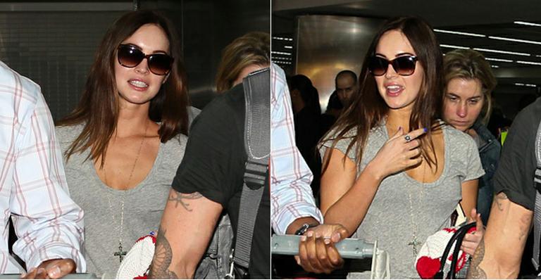 Megan Fox chega ao Brasil ao lado do marido, Brian Austin, e do filho