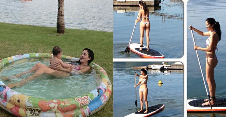 De biquíni, Daniela Albuquerque pratica stand up paddle e brinca com a filha, Alice