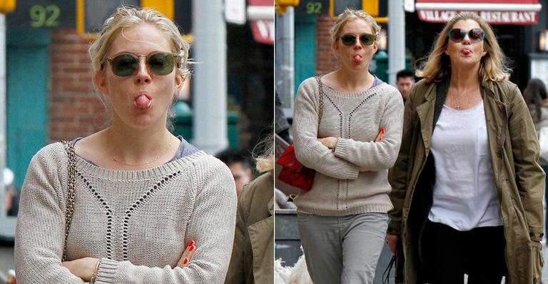 Sienna Miller mostra a língua para fotógrafos