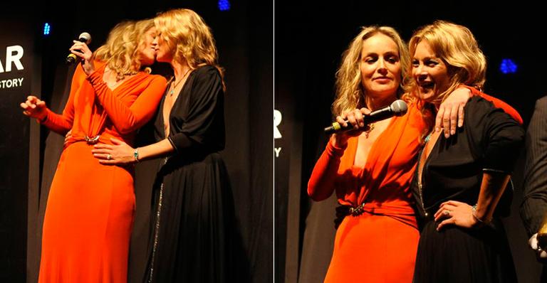 Kate Moss e Sharon Stone dão selinho em baile beneficente da amFAR, em São Paulo