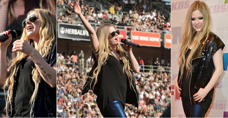 Avril Lavigne exibe barriguinha saliente e reforça rumores de gravidez