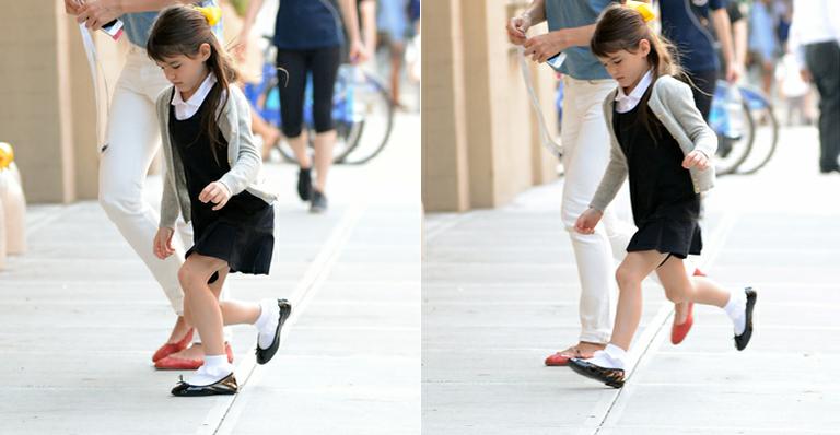 Suri Cruise quebra o braço e passa bem