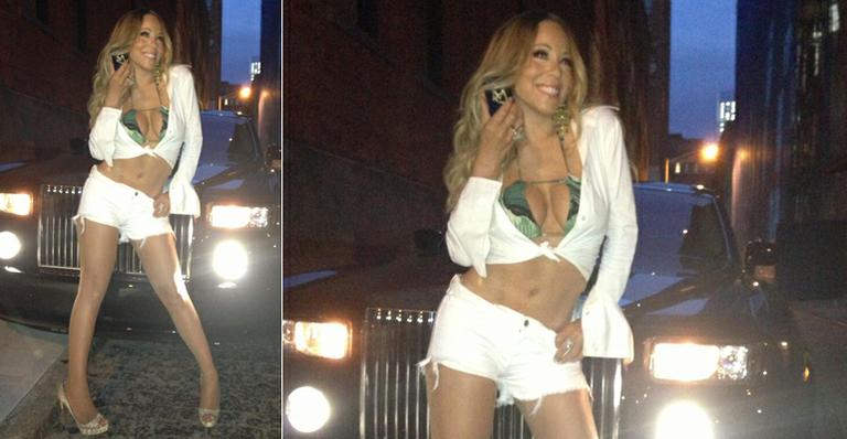 Mariah Carey exibe boa forma com a barriga de fora