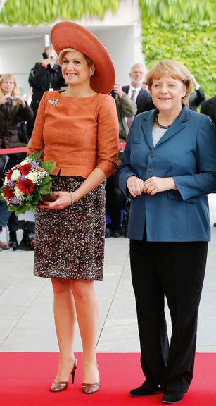 As poderosas Máxima Zorreguieta e Angela Merkel