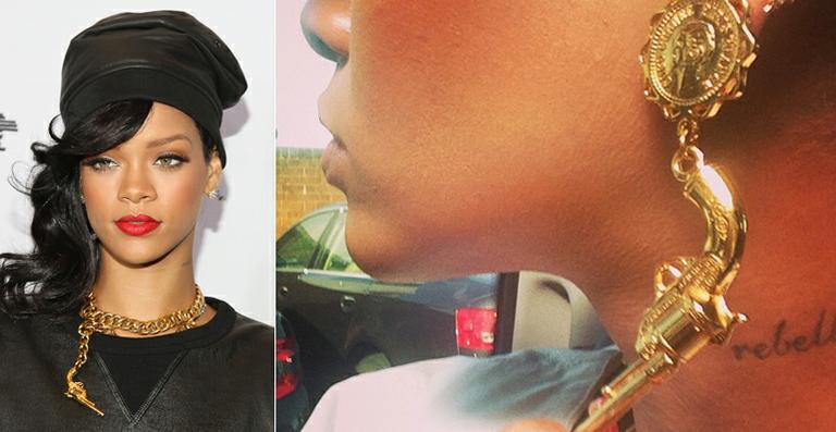 Rihanna aparece com brinco de arma