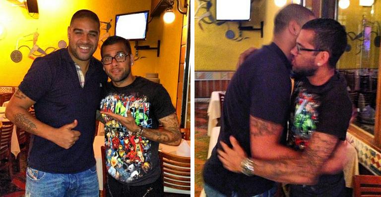 Mais magro, Adriano se encontra com Daniel Alves em churrascaria do Rio
