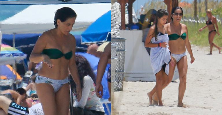 De biquíni, Gloria Pires curte praia em Miami
