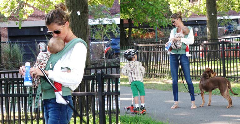 Gisele Bündchen leva os filhos e o cão para passear em parque de Boston, nos EUA
