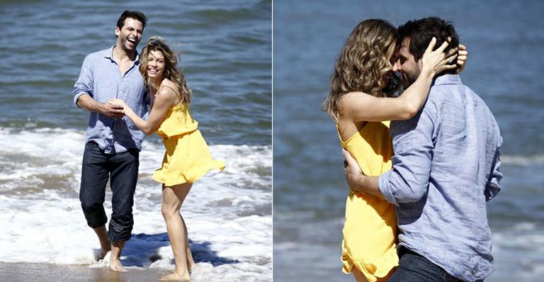 Em clima de romance, Grazi Massafera e Henri Castelli gravam cenas de novela na praia