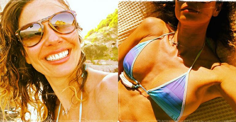 Luciana Gimenez aparece de cabelos cacheados e biquíni em fotos