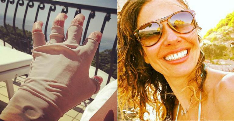 Luciana Gimenez curte férias na Itália e protege as mãos na hora de tomar sol