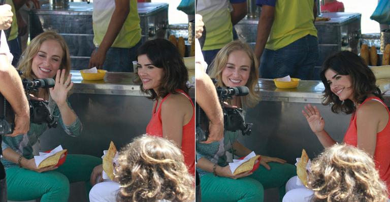 Angélica e Vanessa Giácomo comem pastel de feira em gravação do Estrelas