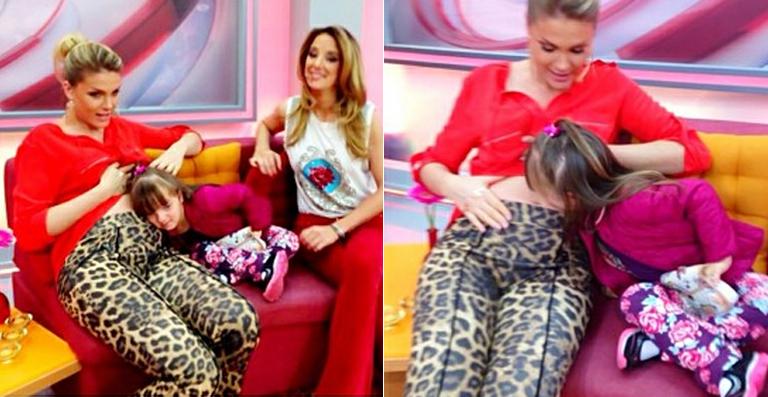 Rafaella Justus dá beijinho na barriga de grávida de Ana Hickmann