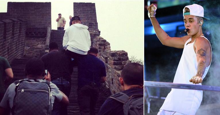 Na Muralha da China, Justin Bieber é carregado pelos seguranças