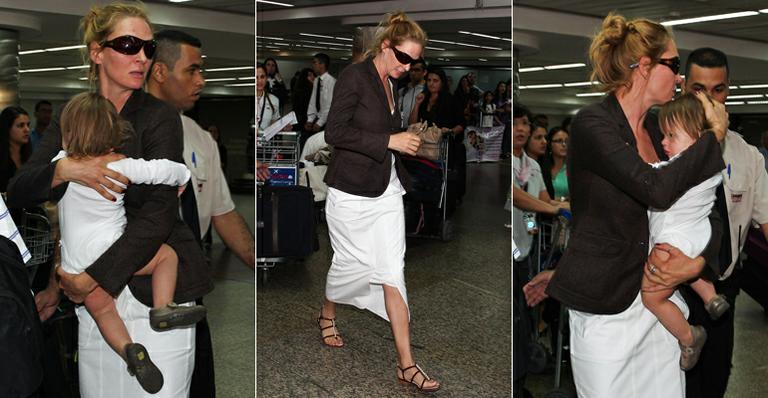 Uma Thurman desembarca em São Paulo com a filha Luna