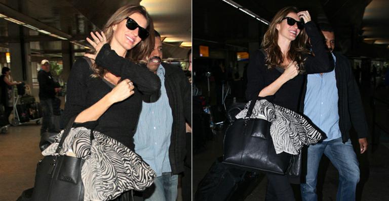 Gisele Bündchen chega ao Brasil para desfilar na SPFW