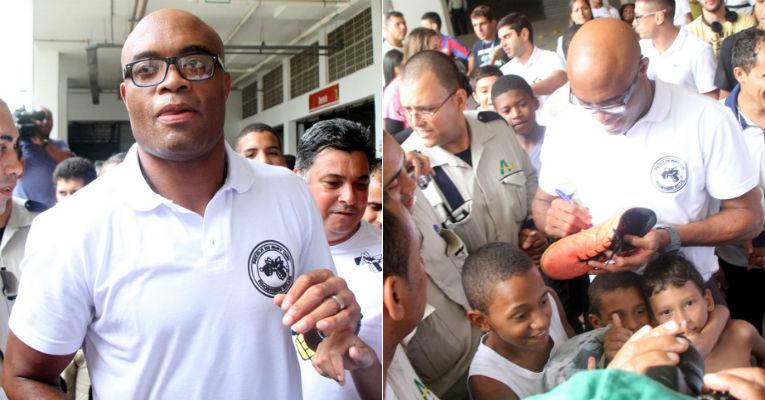 Anderson Silva é assediado por fãs na Rocinha