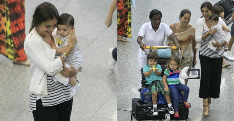 Juliana Paes circula com Pedro e Antonio no aeroporto