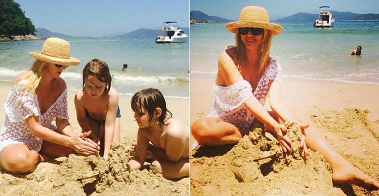 Val Marchiori se diverte na praia ao lado dos filhos