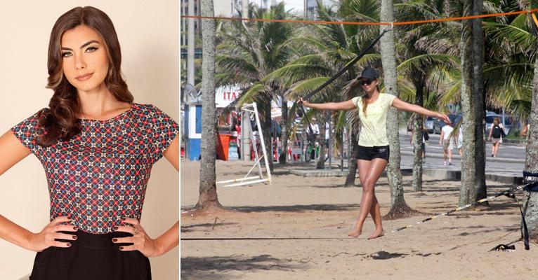 Letícia Wiermann, filha de Datena, pratica slackline e mostra boa forma na praia
