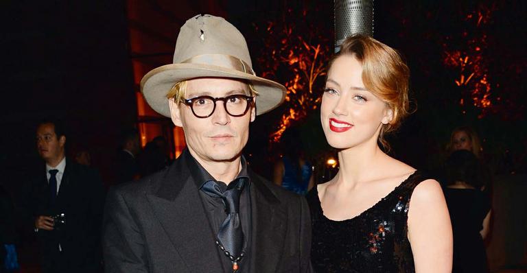 Johnny Depp e Amber Heard em evento de ONG que ajuda crianças com doenças graves