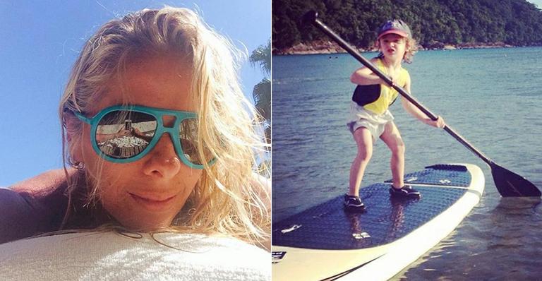 Adriane Galisteu mostra o filho de três anos praticando stand up paddle