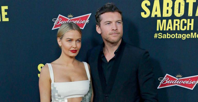 Lara Bingle acompanhou o namorado, Sam Worthington, na estreia de Sabotage