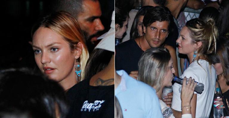 Modelo Candice Swanepoel curte show da banda O Rappa no Brasil