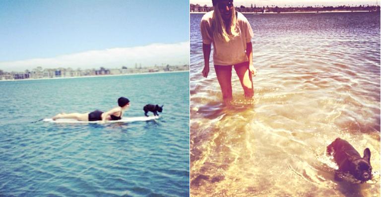 Com look retrô, Lady Gaga surfa ao lado de sua cachorrinha