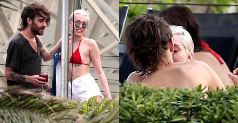 Miley Cyrus beija rapaz durante dia de folga na Espanha