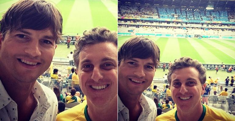 Ashton Kutcher vai ao estádio com Luciano Huck