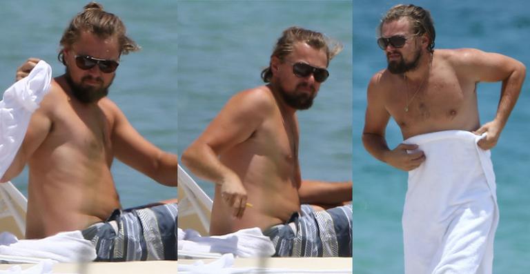 Leonardo DiCaprio exibe barriguinha saliente na praia