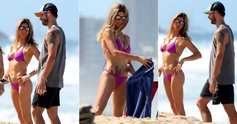 Fernanda Lima e Rodrigo Hilbert levam os filhos gêmeos à praia